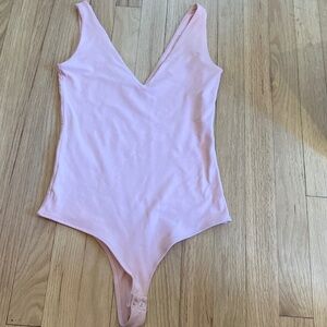 S REORIA deep neckline pink bodysuit
